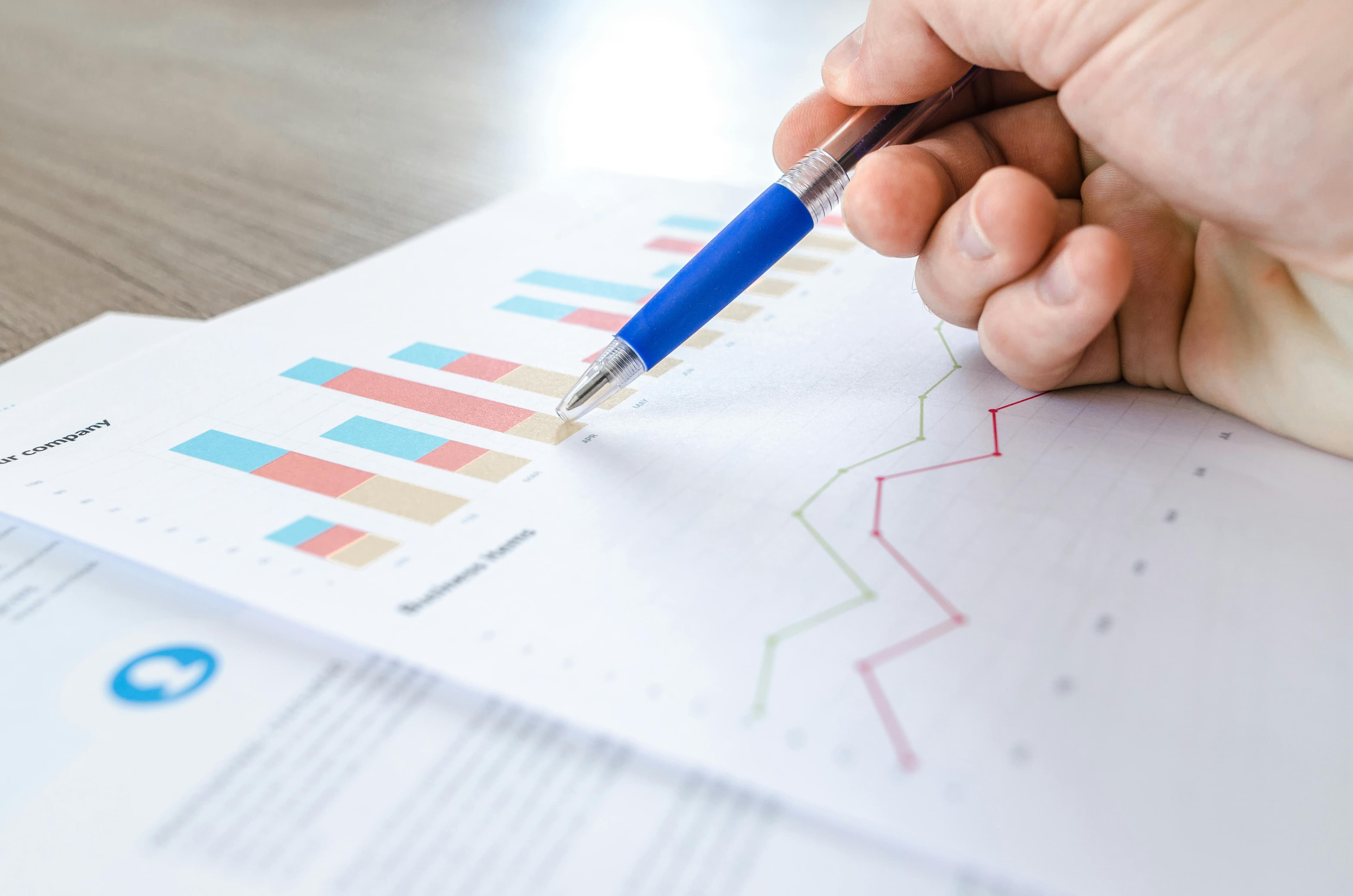 Rising bar chart on a screen, representing universal data with industry-specific interpretation.